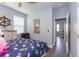 Bedroom featuring wood-look floors, decorative nautical art, and a ceiling fan at 428 Calhoun Falls Dr., Myrtle Beach, SC 29579