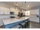 Modern kitchen with stainless appliances, island with seating and pendant lights at 428 Calhoun Falls Dr., Myrtle Beach, SC 29579