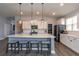 Spacious kitchen with stainless steel appliances, white cabinetry, and large island at 428 Calhoun Falls Dr., Myrtle Beach, SC 29579
