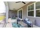 Inviting screened porch with ceiling fans, seating, and view of backyard at 428 Calhoun Falls Dr., Myrtle Beach, SC 29579