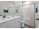 Bright bathroom featuring a white vanity with storage and a shower-tub combination with a white shower curtain at 432 Falling Leaf Loop, Myrtle Beach, SC 29588