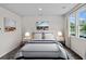 Bright bedroom with hardwood floors, neutral walls, and a comfortable bed at 432 Falling Leaf Loop, Myrtle Beach, SC 29588