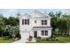 Charming two-story home with white siding, black shutters, and a well-manicured front lawn at 432 Falling Leaf Loop, Myrtle Beach, SC 29588