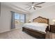 Spacious bedroom with carpet, a tray ceiling, and lots of natural light at 4609 Day Lily Run St., Myrtle Beach, SC 29579