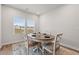 Inviting dining area with a round table, seating for four, and ample natural light at 4609 Day Lily Run St., Myrtle Beach, SC 29579