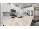 Modern kitchen features granite countertops, stainless steel appliances, and white cabinetry at 4609 Day Lily Run St., Myrtle Beach, SC 29579