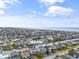 Waterfront property with boat docks in an aerial view showcasing the community at 48 Sw Wilmington St., Ocean Isle Beach, NC 28469