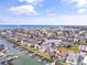 Aerial view of waterfront properties with docks and boats in a canal neighborhood at 48 Sw Wilmington St., Ocean Isle Beach, NC 28469
