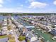 Aerial view of neighborhood, showcasing waterfront homes and the Intercoastal Waterway access at 48 Sw Wilmington St., Ocean Isle Beach, NC 28469