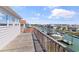 A view from a balcony showing a waterfront community with boats docked along the canal at 48 Sw Wilmington St., Ocean Isle Beach, NC 28469