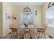 Cozy dining room with natural light and a large table for Gathering gatherings at 48 Sw Wilmington St., Ocean Isle Beach, NC 28469