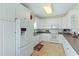 Bright kitchen featuring white cabinetry, modern appliances, and a functional layout at 48 Sw Wilmington St., Ocean Isle Beach, NC 28469