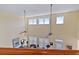 Bright open living room featuring high ceilings, fans, and lots of natural light at 48 Sw Wilmington St., Ocean Isle Beach, NC 28469
