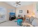 Comfortable living room with a TV, sofa, and a view to the outside at 48 Sw Wilmington St., Ocean Isle Beach, NC 28469