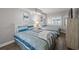Bedroom featuring two beds, closet space, and a lovely window with natural light at 4800 S Ocean Blvd. # 420, North Myrtle Beach, SC 29582