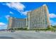 Resort exterior featuring beach access and several rooms with balconies at 4800 S Ocean Blvd. # 420, North Myrtle Beach, SC 29582
