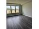 Bright bedroom with large windows providing natural light and views of the surrounding landscape at 531 Oak Landing Dr., Myrtle Beach, SC 29588