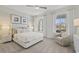 Bright and cozy bedroom featuring a comfortable bed, soft carpet, and natural light streaming through the windows at 531 Oak Landing Dr., Myrtle Beach, SC 29588
