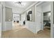 Bright hallway featuring sleek hardwood floors, modern lighting, and decorative wall accents at 531 Oak Landing Dr., Myrtle Beach, SC 29588