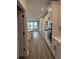 Well-equipped kitchen showcasing white cabinets, granite countertops, stainless steel appliances, and an open layout at 531 Oak Landing Dr., Myrtle Beach, SC 29588