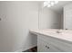 Bathroom featuring a vanity with white countertops and cabinets, and a large mirror at 545 White River Dr. # 15 D, Myrtle Beach, SC 29579