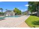 Community pool area with sun loungers and lush landscaping at 545 White River Dr. # 15 D, Myrtle Beach, SC 29579