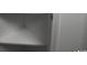Close up view of a white shelf with a white frame at 545 White River Dr. # 15 D, Myrtle Beach, SC 29579