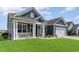 Charming home with a covered front porch and manicured lawn at 567 Hickman St., Surfside Beach, SC 29575