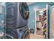 Laundry area features a modern washer and dryer and convenient access to a walk-in closet at 567 Hickman St., Surfside Beach, SC 29575