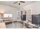 Spacious office featuring a ceiling fan, multiple monitors, and double doors at 567 Hickman St., Surfside Beach, SC 29575