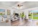 Bright sun room with a comfortable seating area and views of the backyard at 567 Hickman St., Surfside Beach, SC 29575
