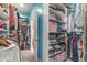 Walk-in closet with custom shelving and racks, providing ample storage space at 567 Hickman St., Surfside Beach, SC 29575