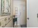 Inviting entryway with coastal decor, neutral walls, and decorative palm tree accents at 5905 South Kings Hwy. # 131B, Myrtle Beach, SC 29575