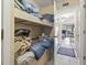 Functional hallway with built-in bunk beds and hallway leading to living area at 5905 South Kings Hwy. # 131B, Myrtle Beach, SC 29575