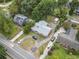 An aerial view of a neighborhood with mature trees and well-maintained homes at 605 62Nd Ave. N, Myrtle Beach, SC 29572