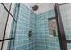 Close-up of a tile shower with contemporary fixtures, and a built-in niche providing both style and functionality at 605 62Nd Ave. N, Myrtle Beach, SC 29572