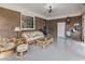 Inviting sunroom with brick walls, wicker furniture, and a casual, relaxed atmosphere at 605 62Nd Ave. N, Myrtle Beach, SC 29572