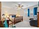 Cozy bedroom featuring a wooden bed frame, soft lighting, and comfortable furniture at 607 A 28Th Ave. S, North Myrtle Beach, SC 29582