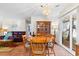 Inviting dining space open to living room with natural light at 607 A 28Th Ave. S, North Myrtle Beach, SC 29582