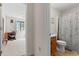 Bright bathroom with a shower, vanity, and neutral decor at 607 A 28Th Ave. S, North Myrtle Beach, SC 29582