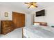 Bedroom with flatscreen TV, furnishings and doorway to another room at 607 A 28Th Ave. S, North Myrtle Beach, SC 29582