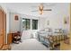 Cozy bedroom featuring two twin beds, a ceiling fan, and a window with natural light at 607 A 28Th Ave. S, North Myrtle Beach, SC 29582