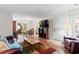Spacious living room with open concept, fireplace, and dining area at 607 A 28Th Ave. S, North Myrtle Beach, SC 29582