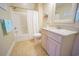 Full bathroom with shower and tub combination featuring granite countertops and tile flooring at 625 Whispering Pines Ct., Murrells Inlet, SC 29576