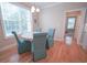 Bright dining area with natural light and seating for four at 625 Whispering Pines Ct., Murrells Inlet, SC 29576