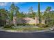 Bellwood Landing entrance with brick signage, lanterns, and manicured landscaping provides a warm welcome to the community at 625 Whispering Pines Ct., Murrells Inlet, SC 29576