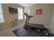 Dedicated exercise room with treadmill and natural light at 625 Whispering Pines Ct., Murrells Inlet, SC 29576