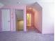 Hallway with a stairway and access to other rooms with pastel walls and carpeted floor at 625 Whispering Pines Ct., Murrells Inlet, SC 29576