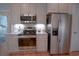 Well-equipped kitchen featuring stainless steel appliances and light cabinetry at 625 Whispering Pines Ct., Murrells Inlet, SC 29576