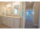 Main bathroom featuring dual vanities and granite countertops at 625 Whispering Pines Ct., Murrells Inlet, SC 29576